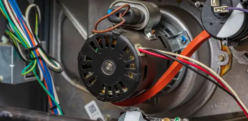 open furnace during routine repair service at Portland home by Multnomah Heating